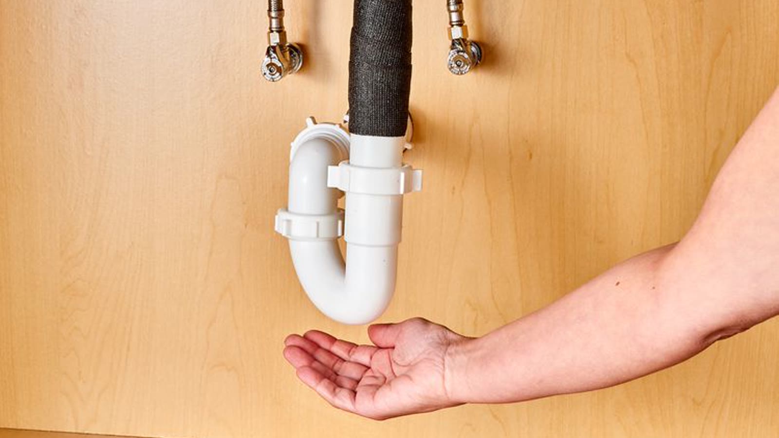 Wake Forest plumber inspecting residential piping